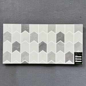 The GPC63001K 300x600mm ceramic wall tile offers a striking combination of geometry and texture, ideal for creating visual interest in contemporary bathrooms and interiors.